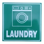 The Laundry Safety Sign is a simple yet effective way to direct people to the designated laundry area. Its clear graphic and bold text make it easy to understand for a diverse audience. The sign's 19x19cm size is large enough to be easily noticeable but small enough to be discreetly placed. This functional sign is a key component of providing clear and helpful information in any facility. Laundry Safety Sign | 19x19cm Benefits and Features